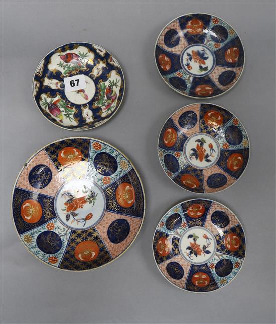 Four Worcester saucer dishes and a bowl largest diameter 18cm